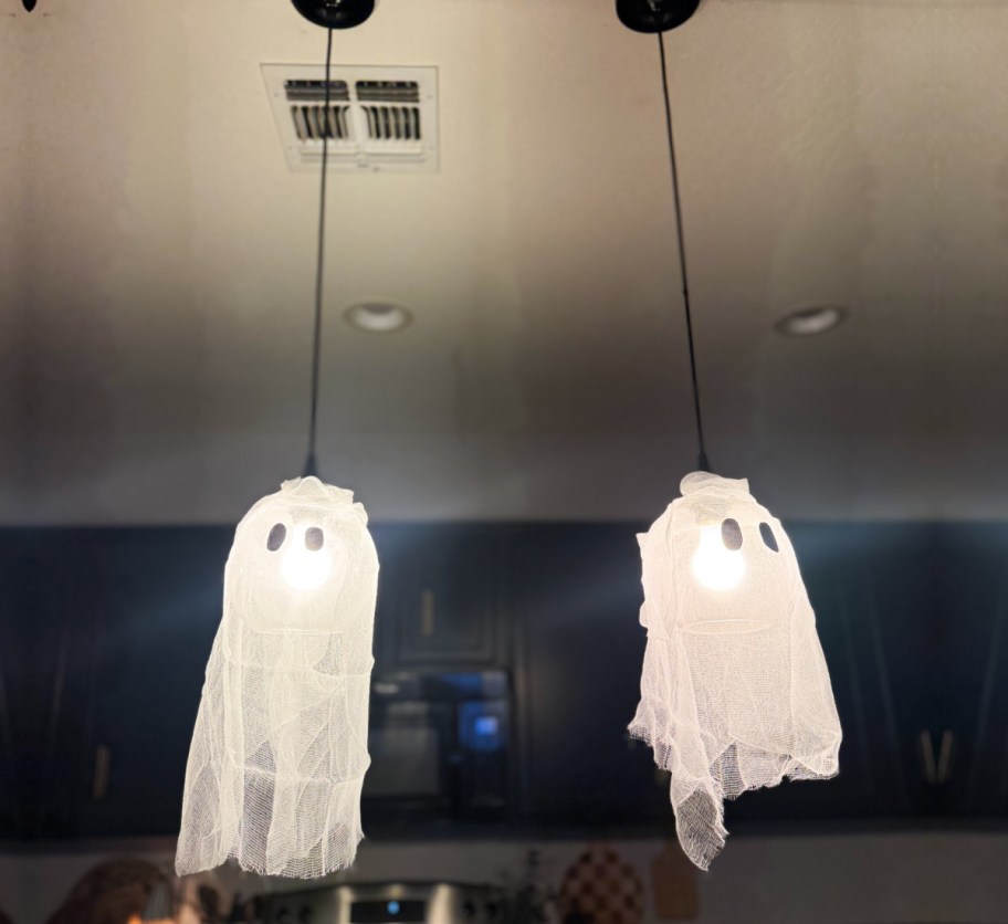 two ghost lights hanging in kitchen