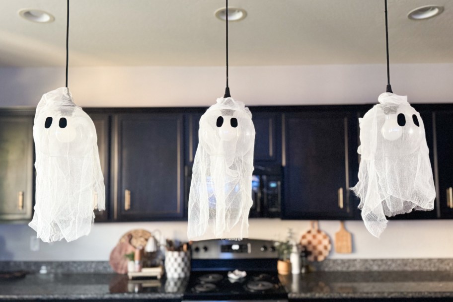 three hanging ghost lights in kitchen