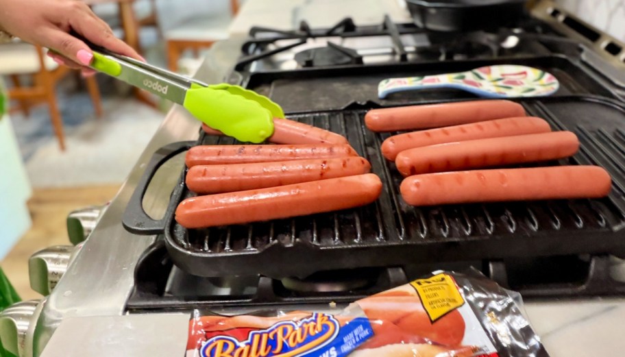 grilling ball park hot dogs on a grill pan
