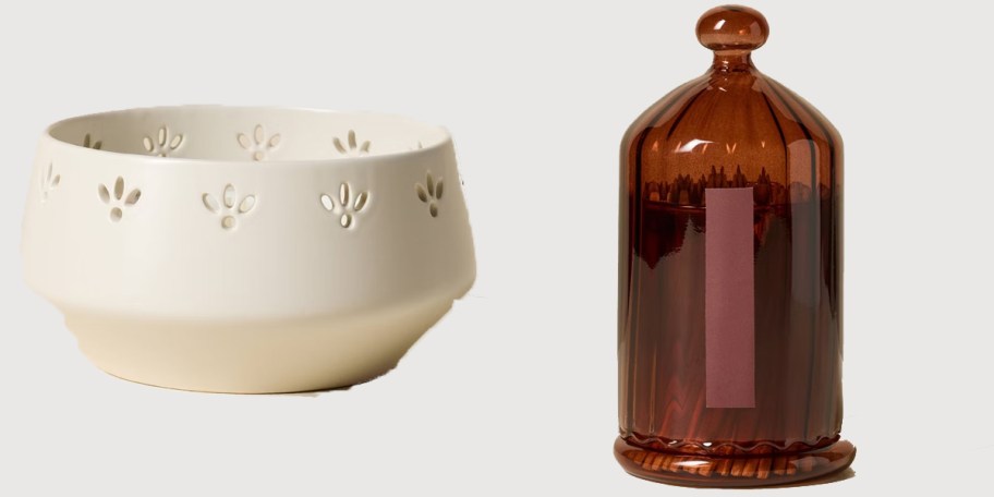 white candle with red match container 