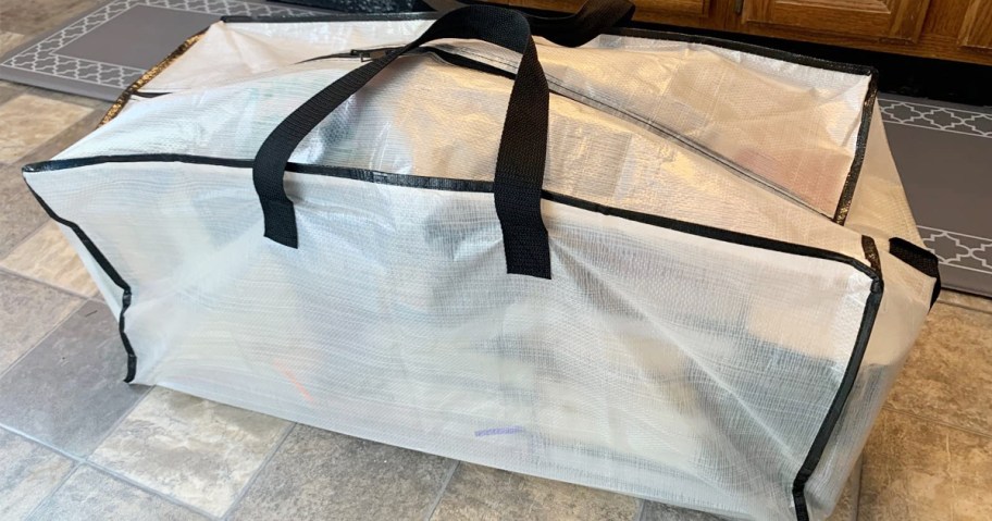 white moving bag on the floor