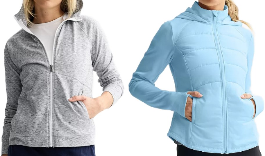 Two women modeling zip-up jackets on a white background, one wearing a heather grey hoodie and the other wearing a light blue quilted jacket.