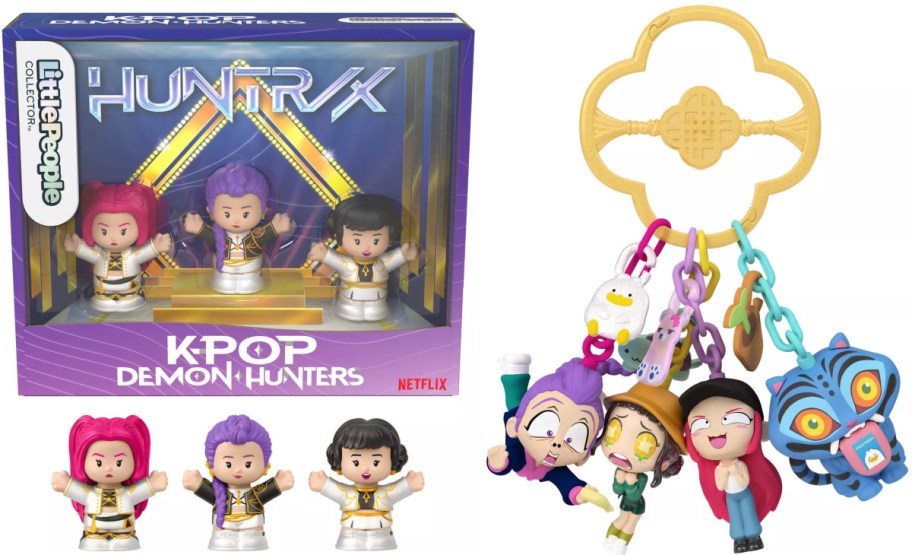 A Little People Collector set of three K-Pop Demon Hunters figures in a purple display box, alongside a gold keychain holding several colorful character and creature charms.
