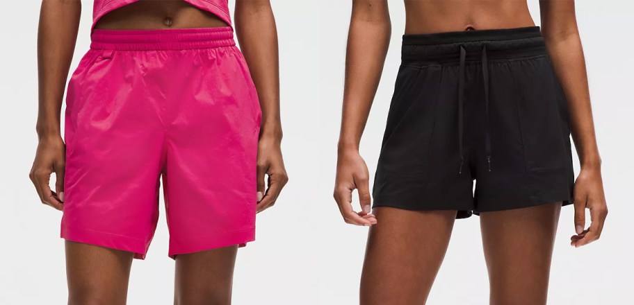 women in pink and black shorts