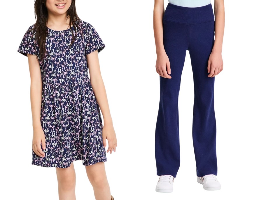 a girl wearing a dress and the legs of a girl wearing leggings