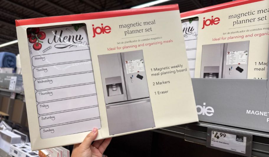 hand holding meal planner at the store