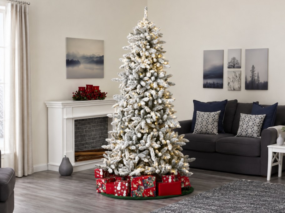 flocked christmas tree in a living room
