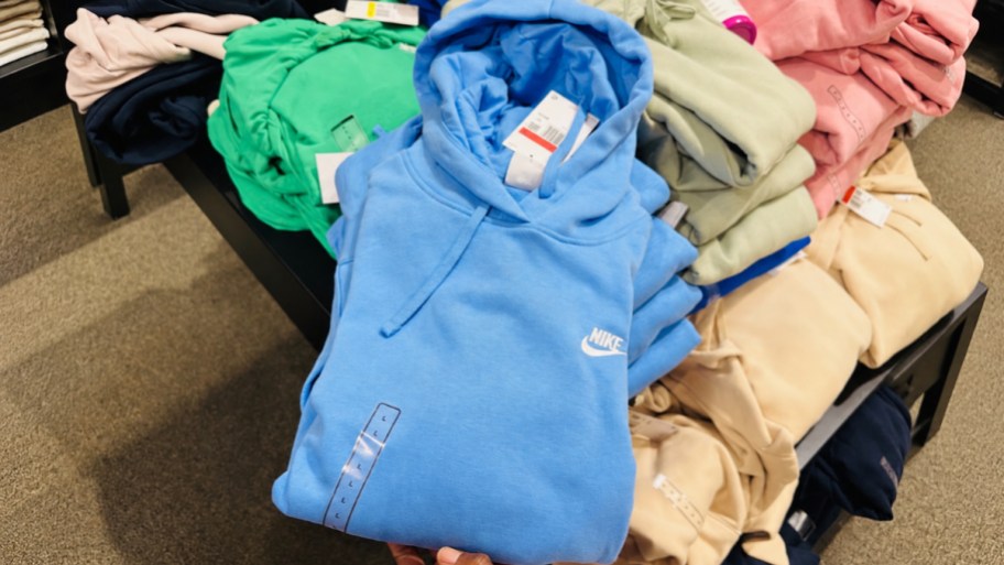 a blue nike kids hoodie