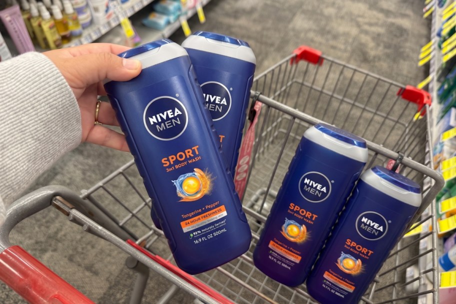 hand grabbing body wash out of cart