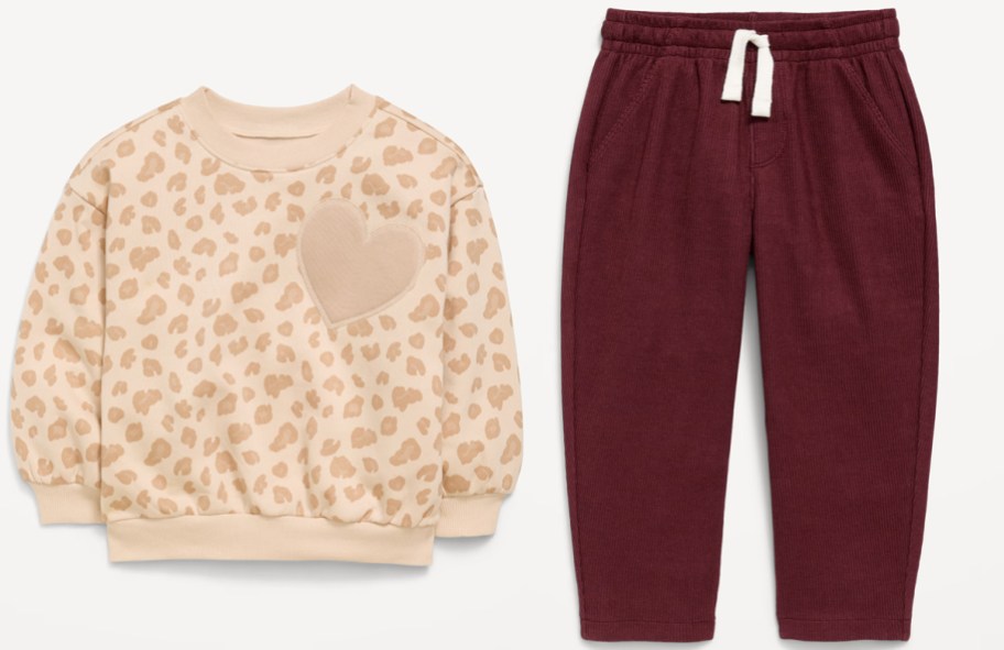 leopard print sweatshirt and red pants