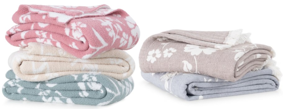 pink, gray and blue throw blankets folded