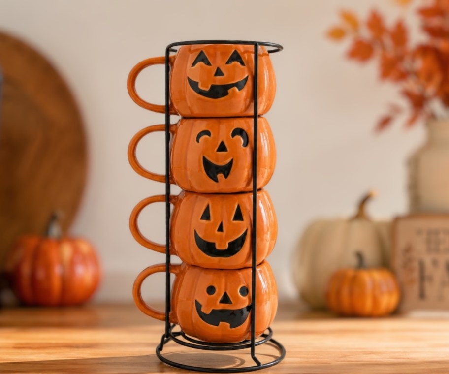 four jack o lnatern stacking mugs