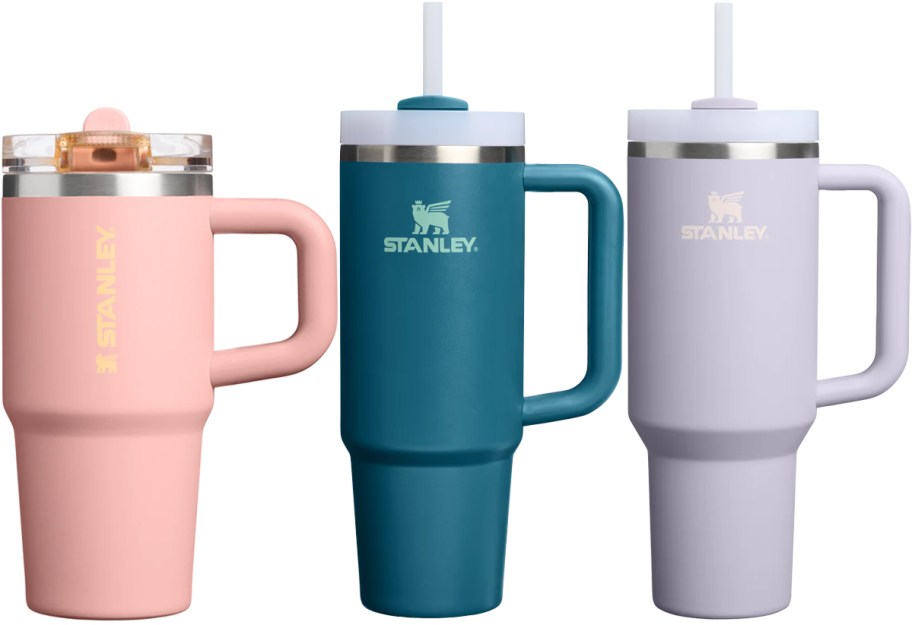 pink, teal, and purple stanley tumblers