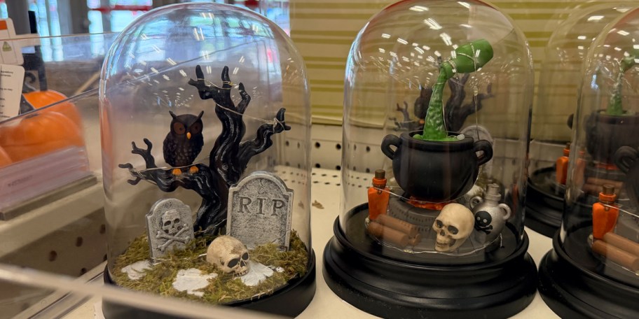 glass halloween decor on shelf 