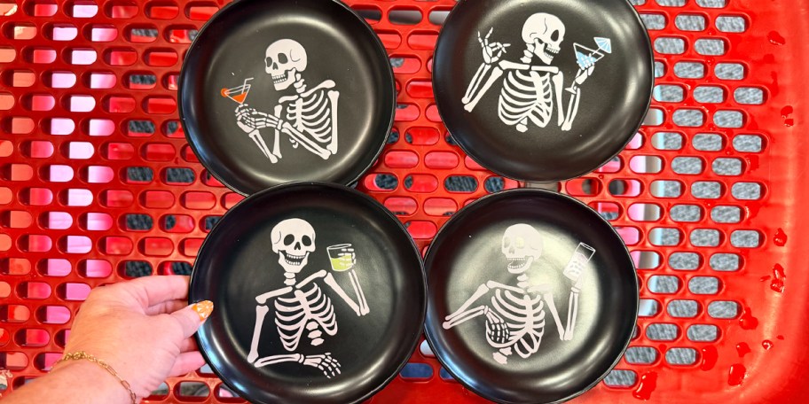 4 black skeleton plates in cart 