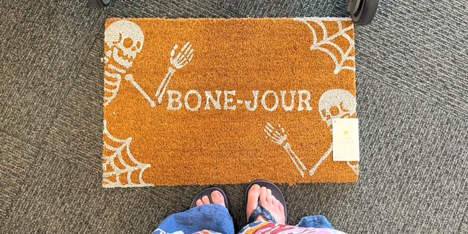brown skeleton doormat on ground 