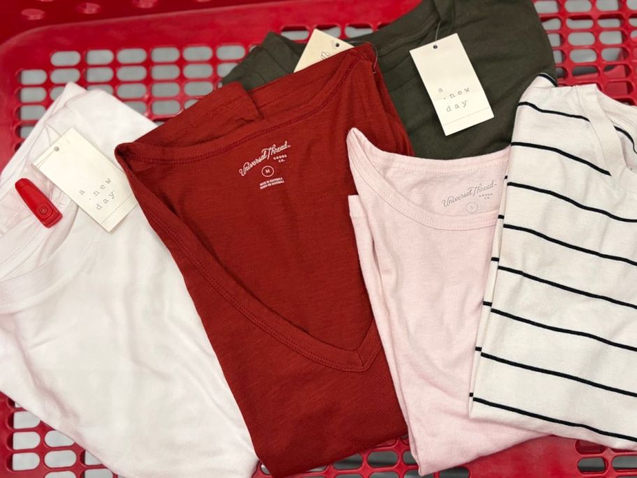 women's tops folded in target cart in store