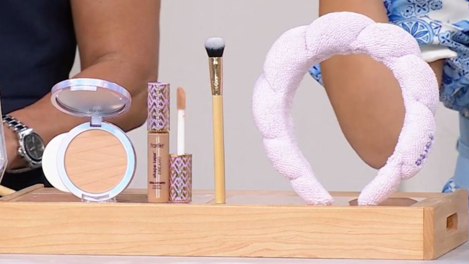 tarte four piece complexion kit displayed on top of wooden block