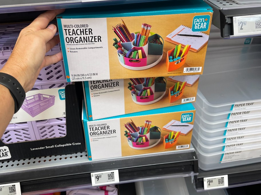 teacher organizers in boxes on shelf 