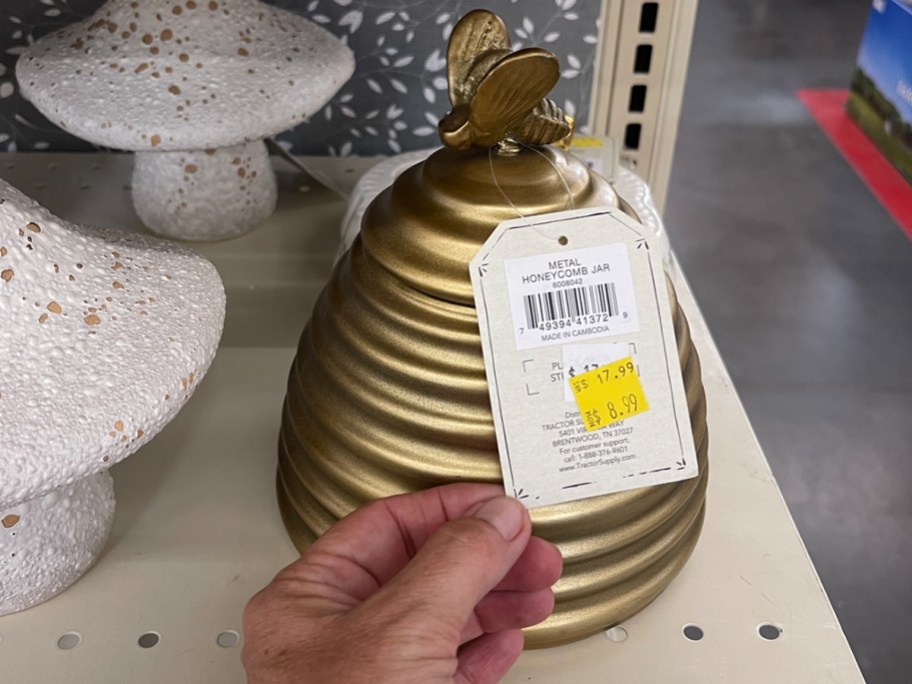 gold honeycomb jar on shelf