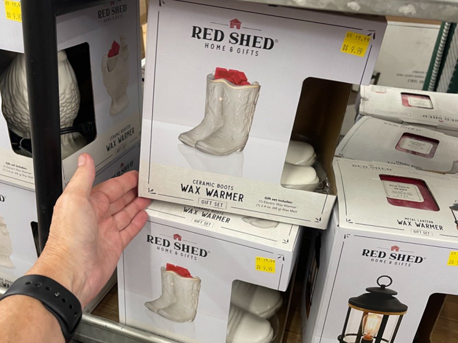 hand holding wax warmer boots