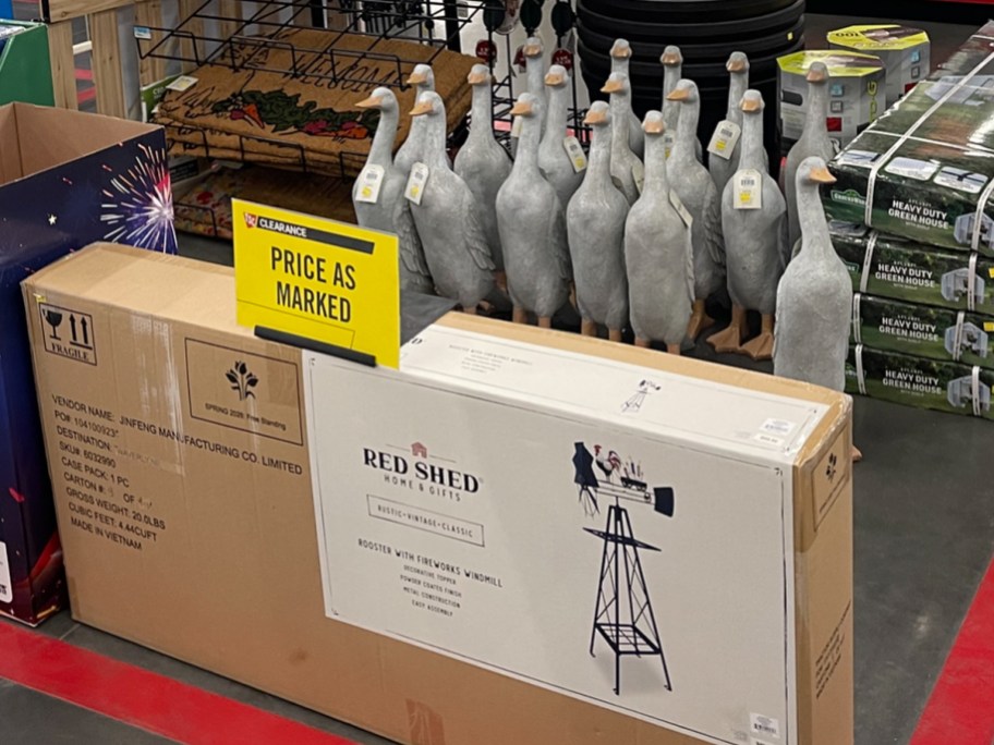 duck statues and windmill box