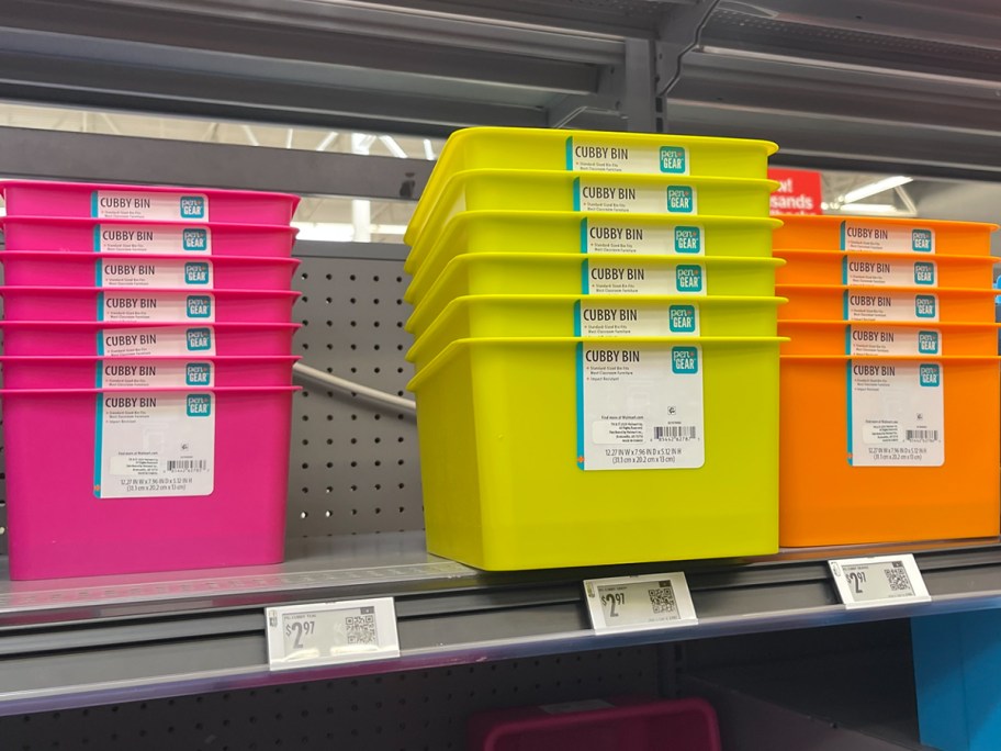 pink, green, and orange cubby bins 