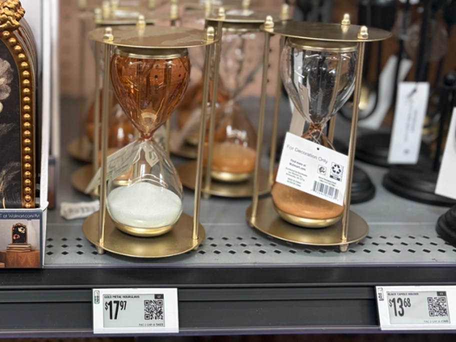 gold hourglass timer on shelf