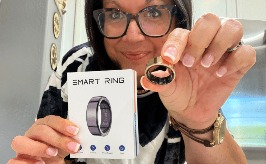 woman holding an amazon smart ring