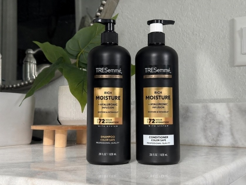 bottles of shampoo & conditioner displayed on a bathroom counter
