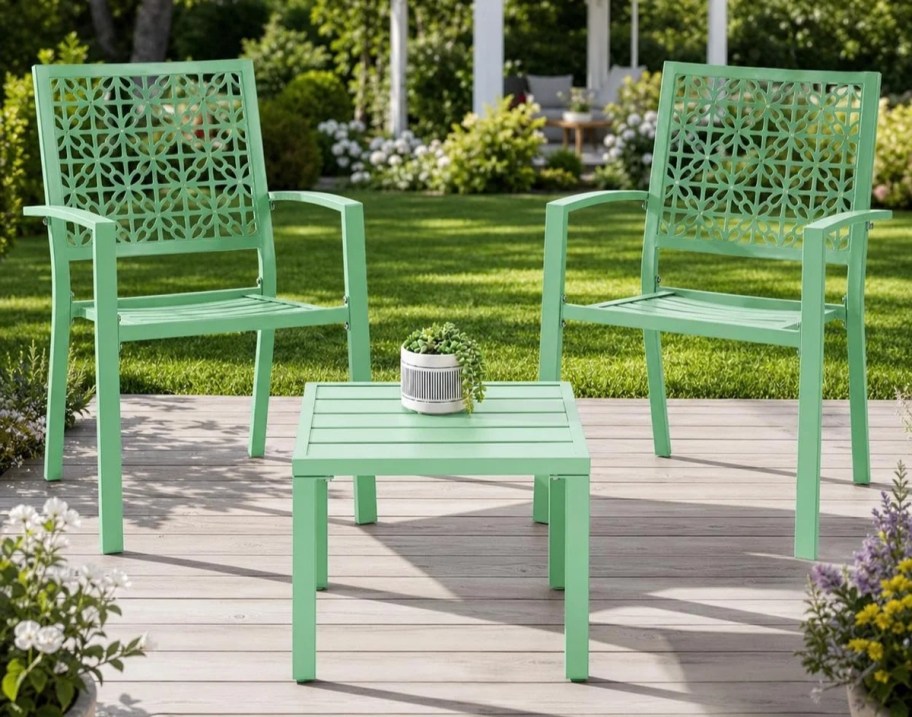 a green outdoor patio set