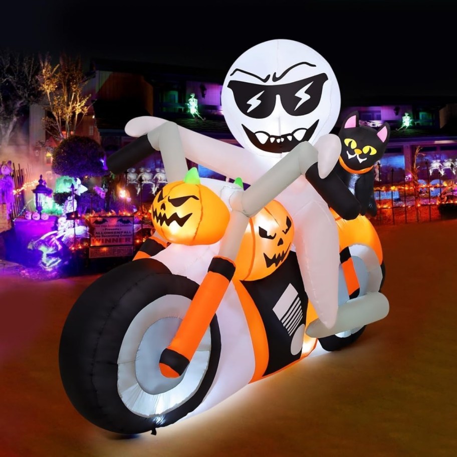 motorcycle ghost w/cat inflatable in a yard
