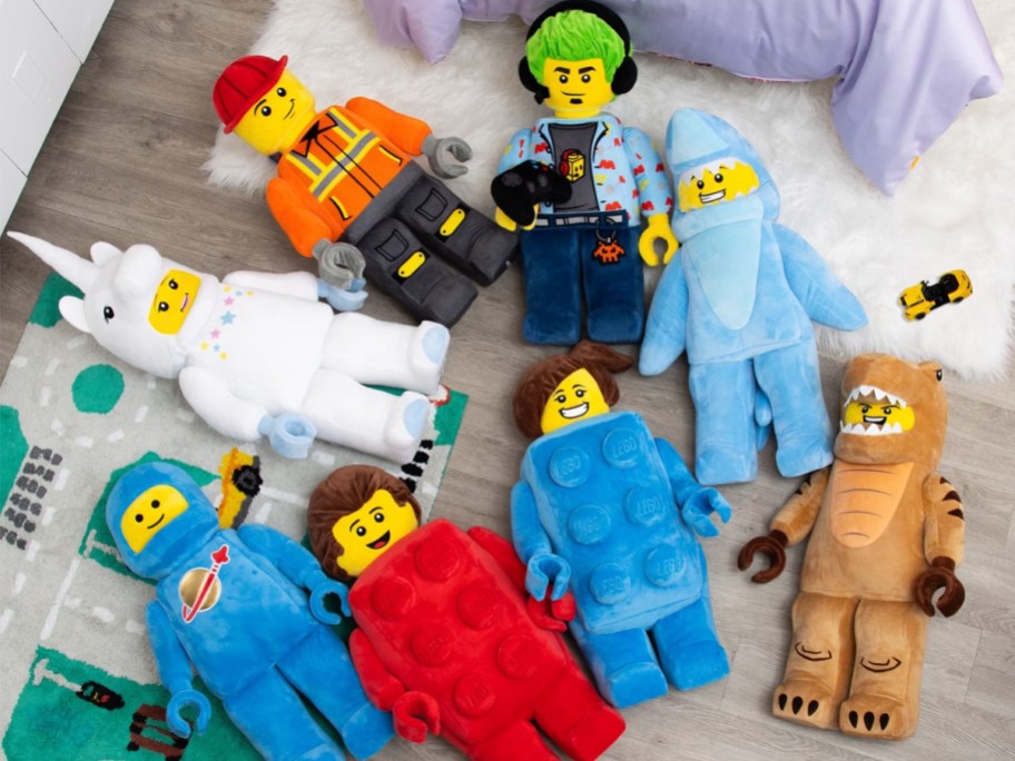 8 LEGO Pillow Buddies in a group on the floor
