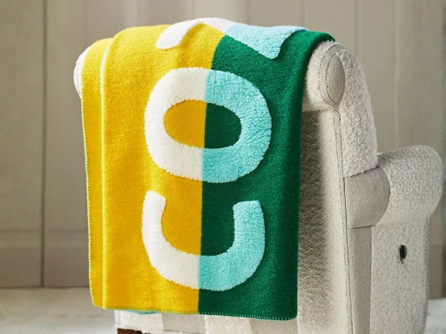 Anthropologie Juno Wool Blend Sherpa Fleece Throw Blanket on chair