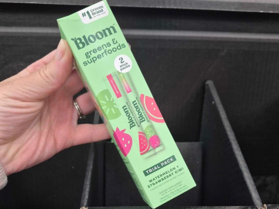 Bloom Greens & Superfoods Stick 2-Count in hand in store