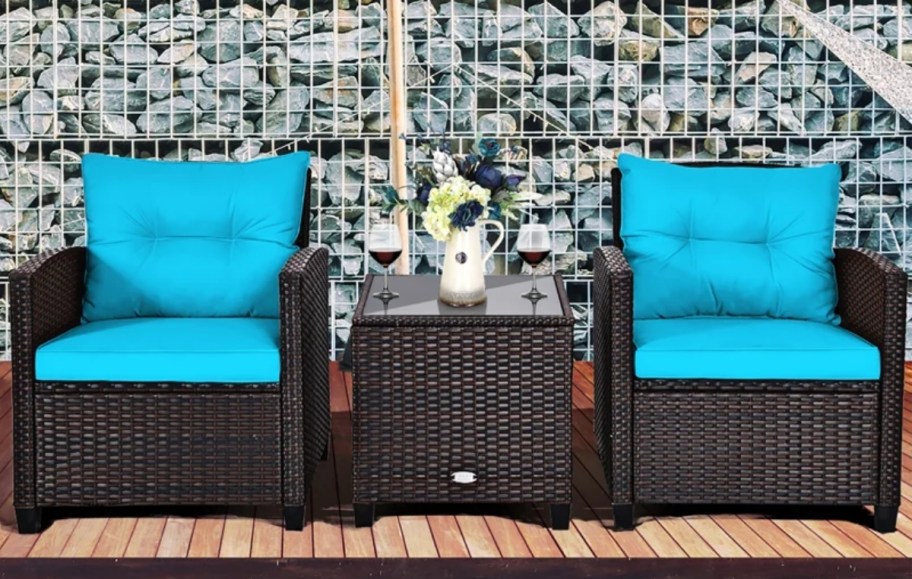brown wicker patio set with aqua cushions