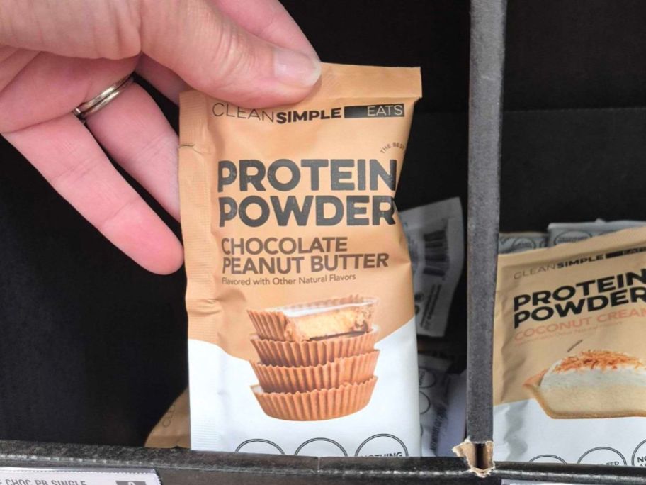Clean Simple Eats Protein Powder in hand in store