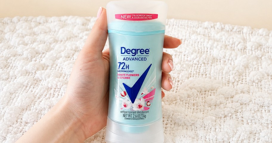 hand holding a blue stick of Degree Women's Deodorant