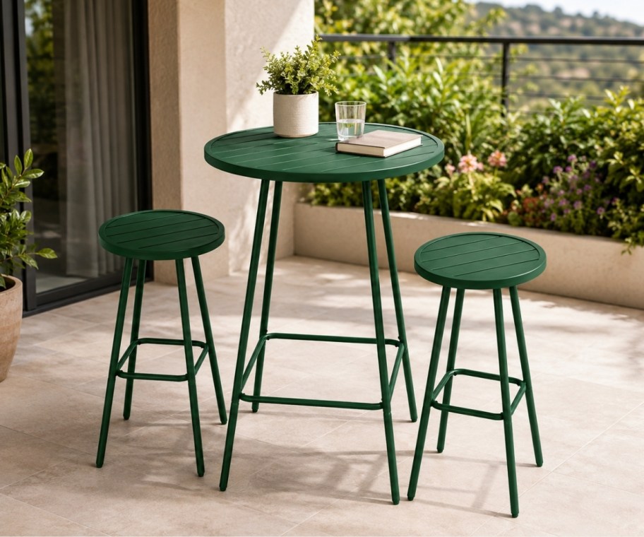 3 piece bar height bistro table and backless stools in greeb