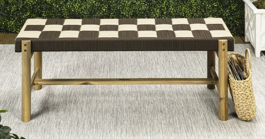 brown and white woven checkerboard bench