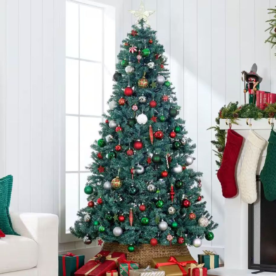Christmas tree with decor around and under it