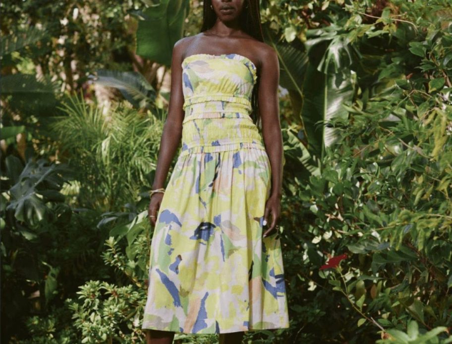woman wearing Free Assembly Women's Strapless Cotton Poplin Tiered Midi Dress in garden