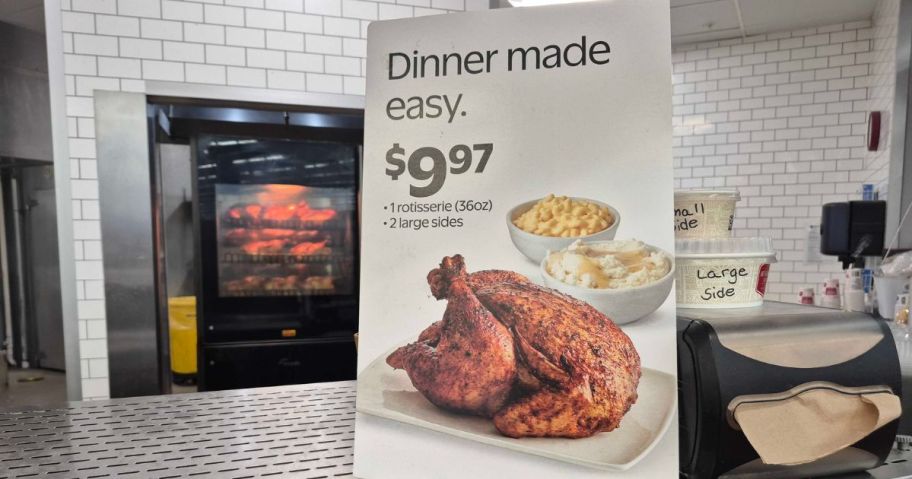 Freshness Guaranteed Hot and Ready-to-Eat Traditional Rotisserie Chicken Meal Bundle sign on counter in store