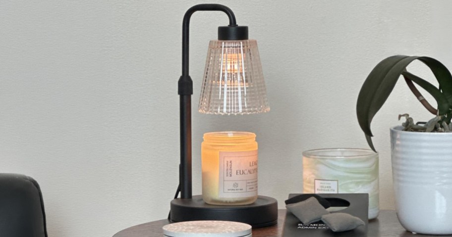 candle warming lamp sitting on a table