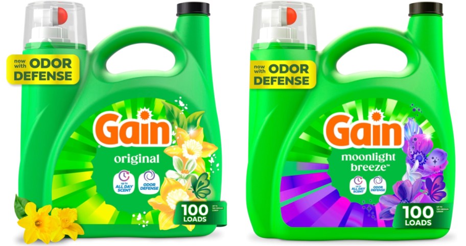 two large green bottles of gain laundry detergents