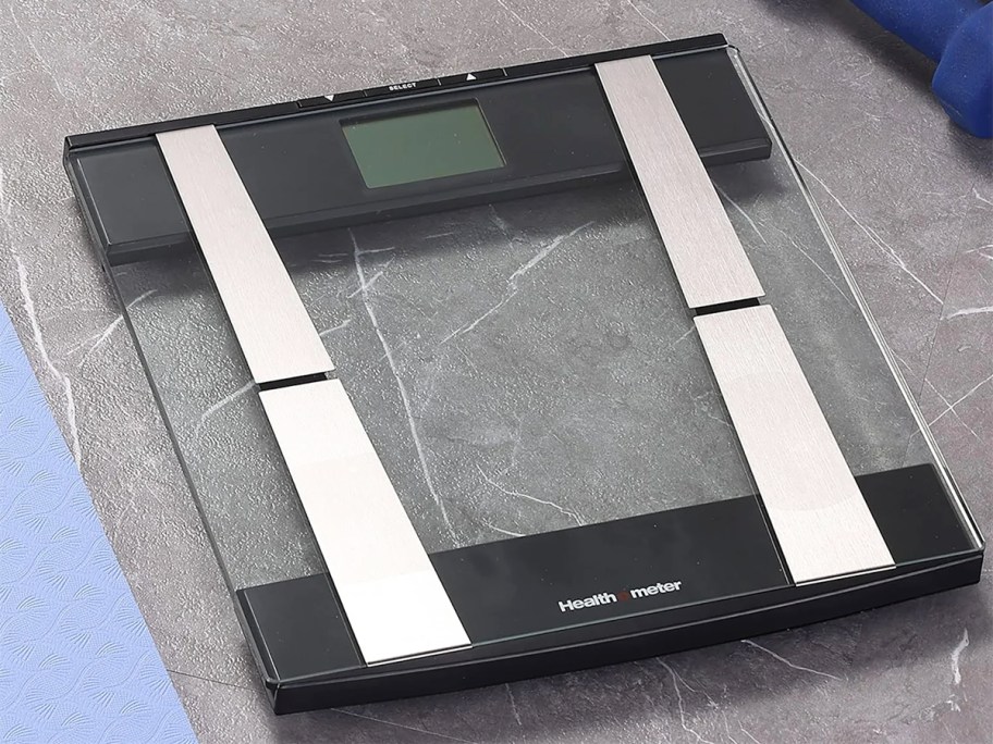 glass scale on bathroom floor