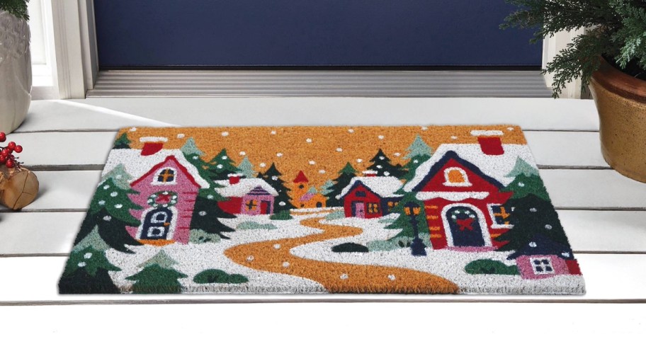ski village print doormat at a door