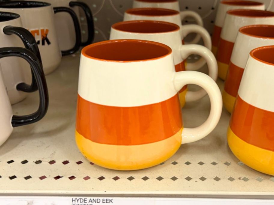 Hyde & EEK! Boutique Candy Corn Mugs on shelf in store