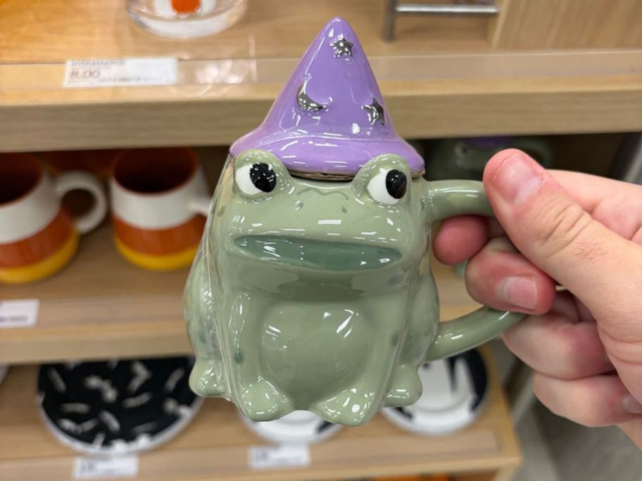 Hyde & EEK! Boutique Mini Frog w/ Lid Mug in hand in store