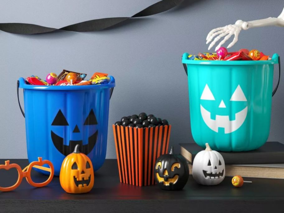 a blue and teal Hyde and EEK! Boutique Halloween Trick or Treat Pail on table